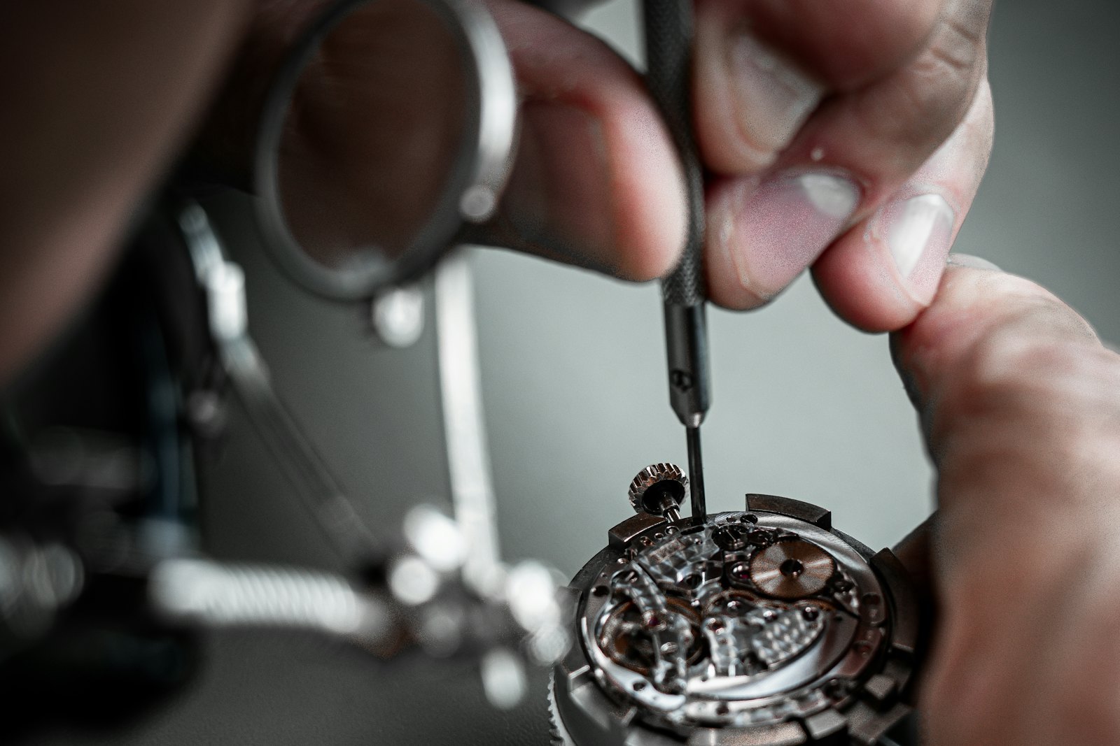 Watchmaker working on a mechanical movement